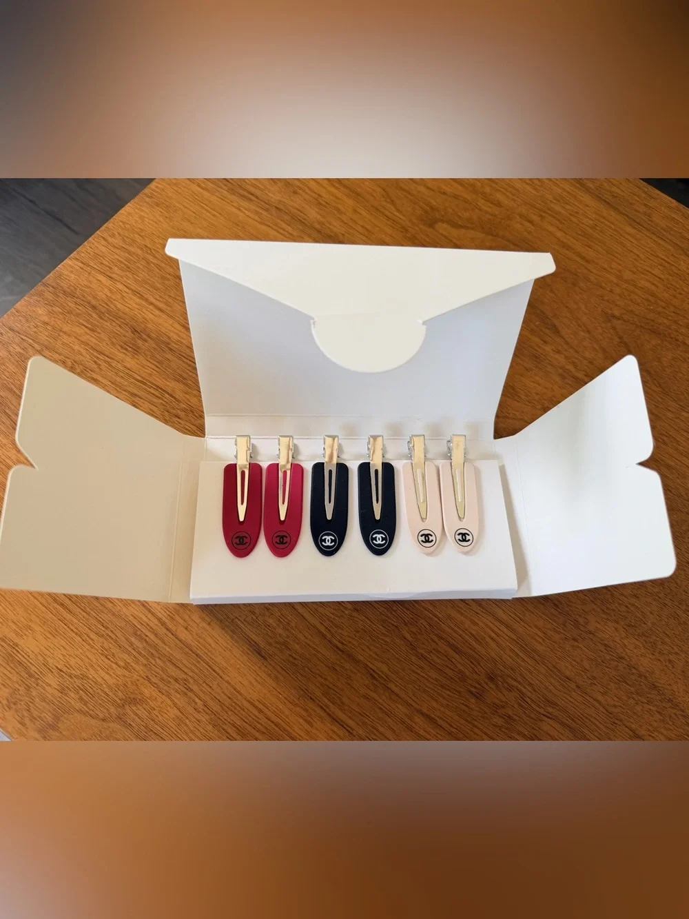 Chanel Beaute Set of 6 Alligator Style Hair Pins, 2 of each Black, Red & Cream.
